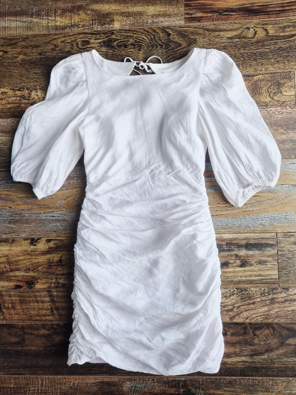 Showpo. 100% Linen Puff Sleeves Ruched Sexy Open Back Mini Dress White - Picture 2 of 16